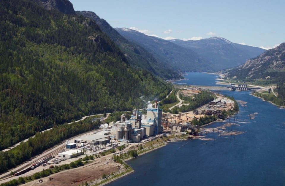 A pulp mill in a forested British Columbia river valley